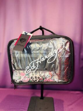 Ed Hardy 4-pc Clear Cosmetic Travel Case with Black Trim Pink Floral Designs